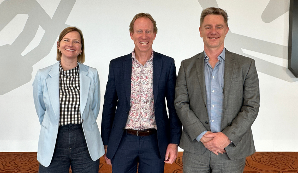 Three people standing whilst their photo is being taken. South East Water Managing Director Lara Olsen, Barwon Water Managing Director Shaun Cumming and Iota Chief Executive Officer Daniel Sullivan.