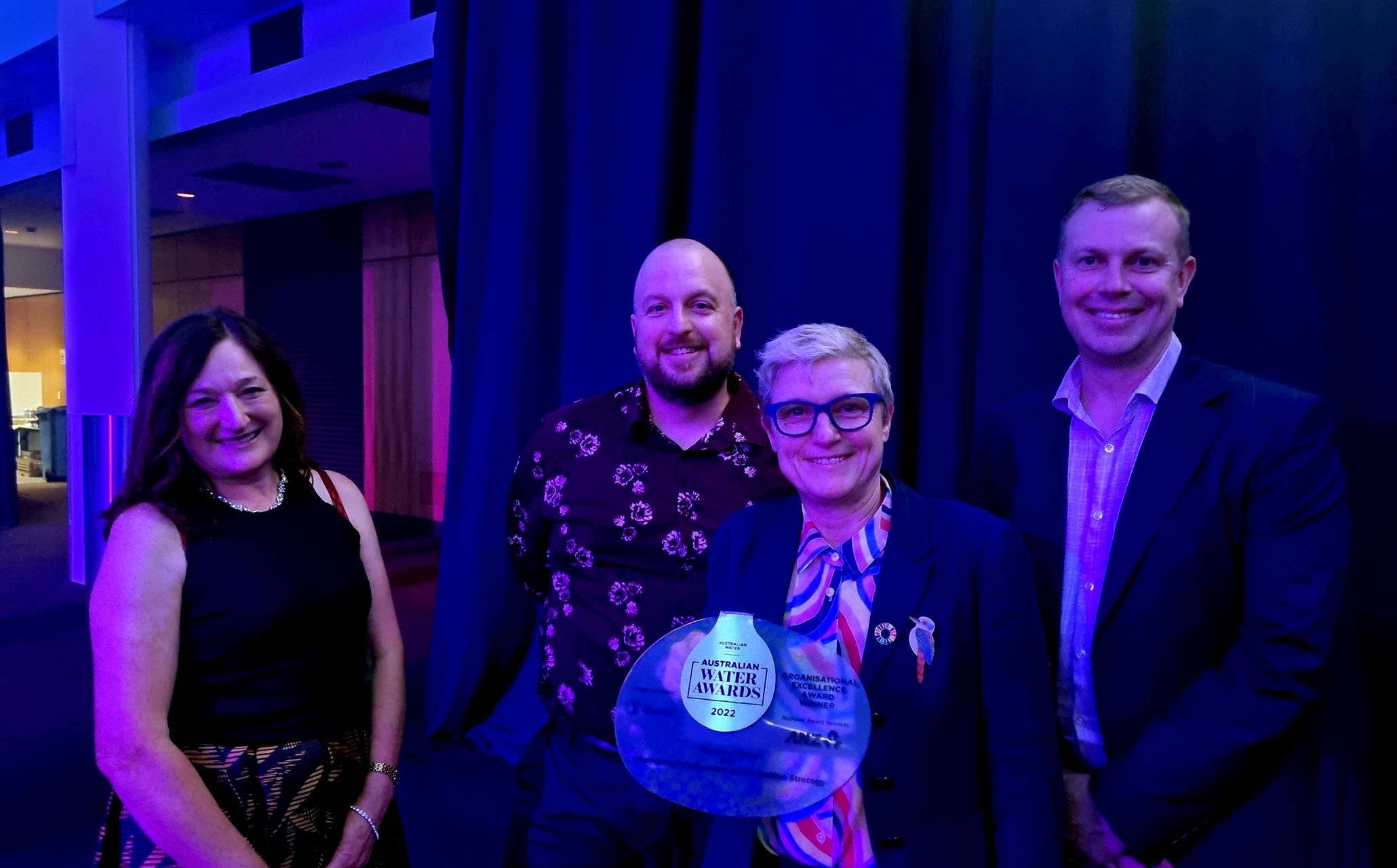 Photograph of Tracey Slatter and the Barwon Water team holding the award.